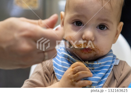 Baby Feeding Time with Messy Face Baby Feeding Time with Messy Face 132163625