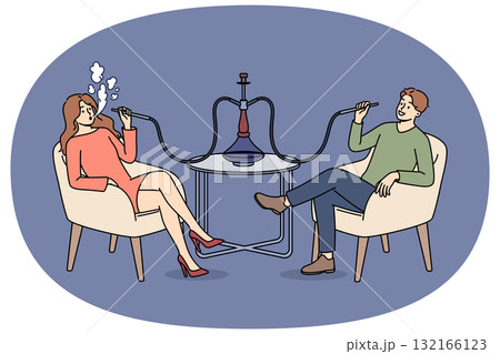 Man and woman smoke turkish hookah, sitting at table in bar and enjoying taste of tobacco Man and woman smoke turkish hookah, sitting at table in bar and enjoying taste of tobacco 132166123