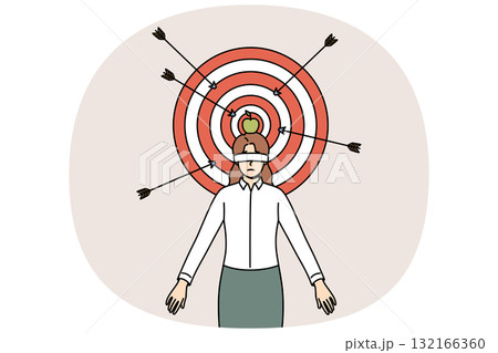 Business woman takes risks to achieve career goals, stands blindfolded near dartboard 132166360