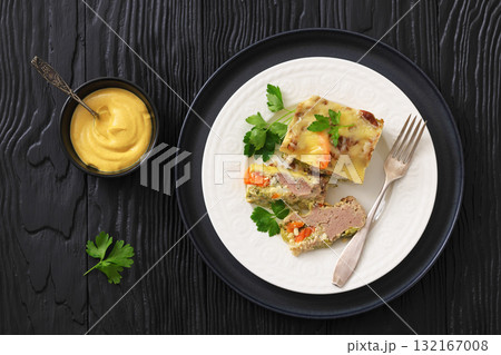 Cheesy ground meat vegetables casserole on a plate Cheesy ground meat vegetables casserole on a plate 132167008