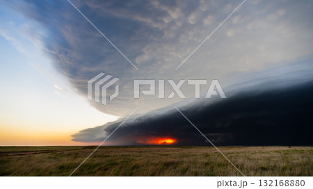 Amazing storm clouds creep closer dark and powerful weather scene Amazing storm clouds creep closer dark and powerful weather scene 132168880