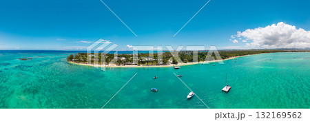 Drone panorama of Mauritius turquoise lagoon with catamarans white sand beach tropical resort coastline clear summer sky 132169562