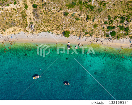 Breathtaking bird's eye perspective of a remote pristine shoreline showcasing the raw beauty of the Adriatic Sea 132169584