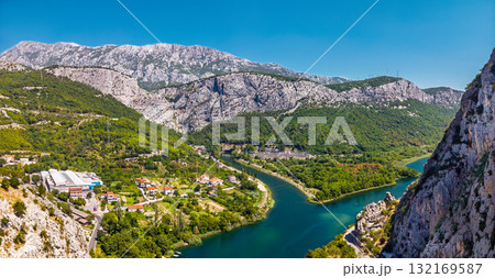 Breathtaking high angle view of the emerald green Cetina River flowing through a majestic rocky gorge 132169587