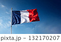 Somalias flag waving under a clear blue sky with fluffy white clouds on a sunny day 132170207