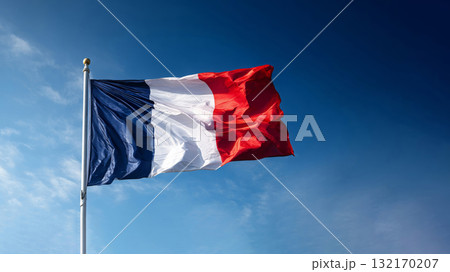Somalias flag waving under a clear blue sky with fluffy white clouds on a sunny day 132170207