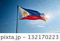 Somalias flag waving under a clear blue sky with fluffy white clouds on a sunny day 132170223