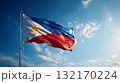 Somalias flag waving under a clear blue sky with fluffy white clouds on a sunny day 132170224