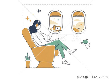 飛行機内で本を読んでリラックスする女性 132170829