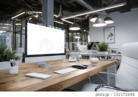 An elegant desktop computer with a blank white screen sits on the desk. Ideal for productivity and creative work. An elegant desktop computer with a blank white screen sits on the desk. Ideal for productivity and creative work. 132172698
