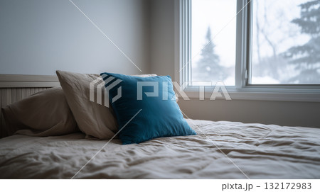 Serene home interior with natural light and comfortable pillow on bed 132172983