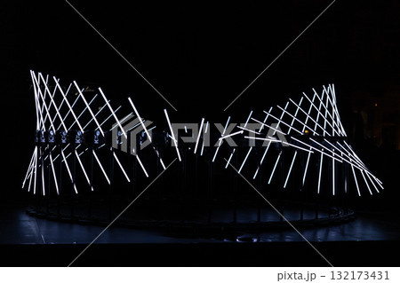 The fascinating night scene captures a modern light installation that dominates the space with a futuristic aesthetic and consists  132173431