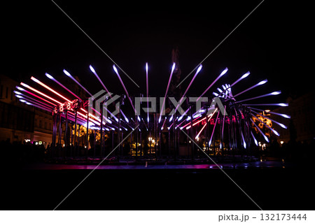 The fascinating night scene captures a modern light installation that dominates the space with a futuristic aesthetic and consists The fascinating night scene captures a modern light installation that dominates the space with a futuristic aesthetic and consists 132173444