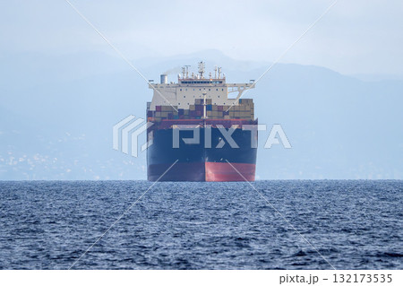 big container ship prow frontal view in the sea 132173535