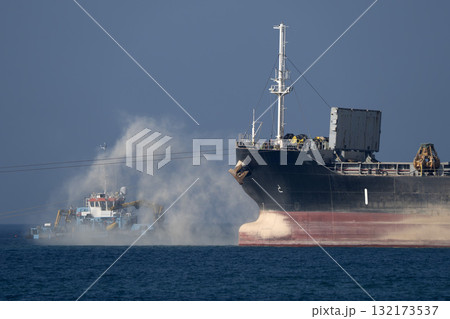 Ships working building genoa new breakwater in front of the harbor 132173537