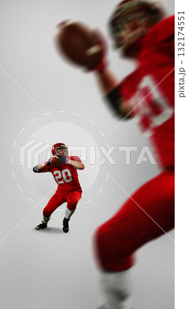 Graphic composition. Focused football player in red uniform holding ball before throw with determination Graphic composition. Focused football player in red uniform holding ball before throw with determination 132174551