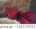 teddy bear lying on couch 132175553