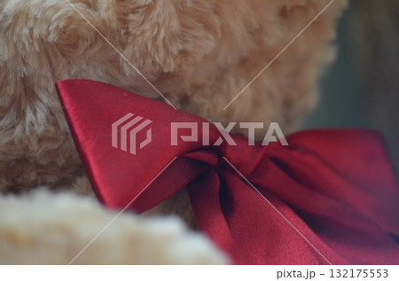 teddy bear lying on couch 132175553