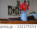 vase with flowers on the table 132175554