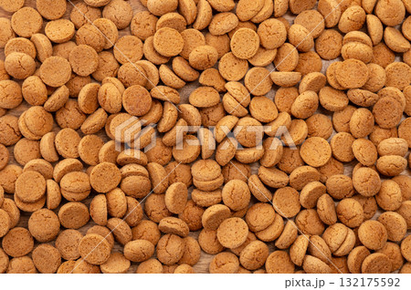 Background Dutch holiday Sinterklaas with copy space for text. Kruidnoten cookies and traditional hollands sweets. 132175592