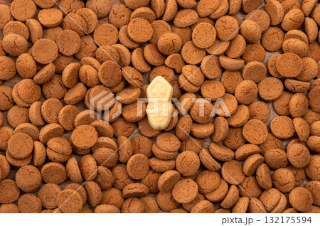 Background Dutch holiday Sinterklaas with copy space for text. Kruidnoten cookies and traditional hollands sweets. 132175594