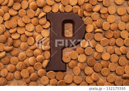 Background Dutch holiday Sinterklaas with copy space for text. Kruidnoten cookies and traditional hollands sweets. Background Dutch holiday Sinterklaas with copy space for text. Kruidnoten cookies and traditional hollands sweets. 132175595