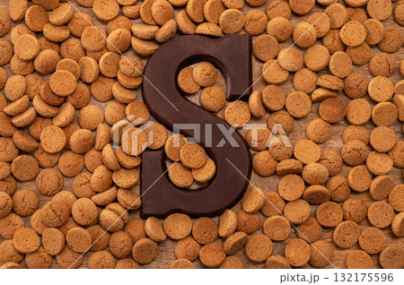Background Dutch holiday Sinterklaas with copy space for text. Kruidnoten cookies and traditional hollands sweets. 132175596