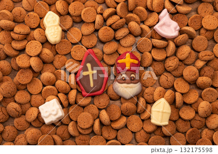 Background Dutch holiday Sinterklaas with copy space for text. Kruidnoten cookies and traditional hollands sweets. Background Dutch holiday Sinterklaas with copy space for text. Kruidnoten cookies and traditional hollands sweets. 132175598