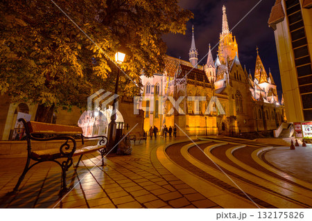 Fishermans Bastion is the panoramic viewing terrace with fairy tale towers in Budapest. View at night Fishermans Bastion is the panoramic viewing terrace with fairy tale towers in Budapest. View at night 132175826