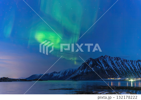 Lofoten Norway, aurora borealis northern lights winter landscape at Gimsoysand Lofoten Norway, aurora borealis northern lights winter landscape at Gimsoysand 132178222