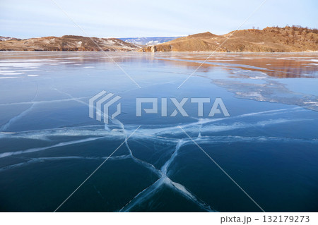 Lake Baikal in December. View of the frozen Kurkut Bay Lake Baikal in December. View of the frozen Kurkut Bay 132179273