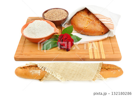 Homemade Bread, Flour, and Grain Still Life on White 132180286