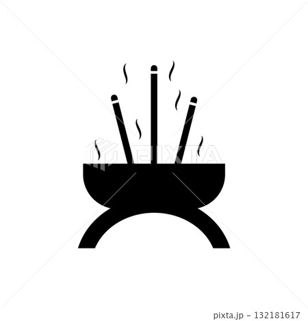 incense sticks in a pot. 132181617