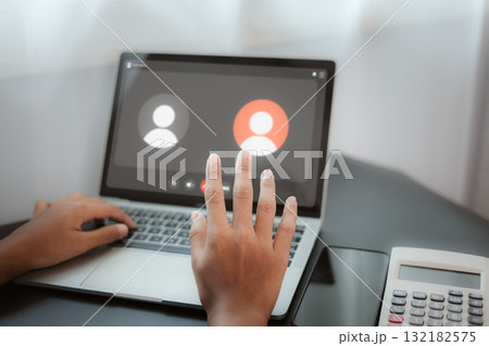 Online Video Call and Remote Meeting Communication on Laptop Online Video Call and Remote Meeting Communication on Laptop 132182575