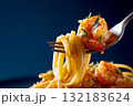 Hyperrealistic close-up of fork holding spaghetti with shrimp and herbs on dark background 132183624