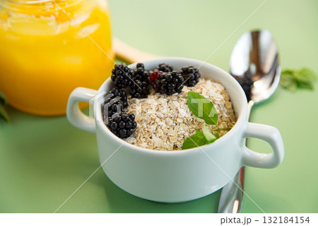 Diet food from oatmeal and fresh fruits Diet food from oatmeal and fresh fruits 132184154