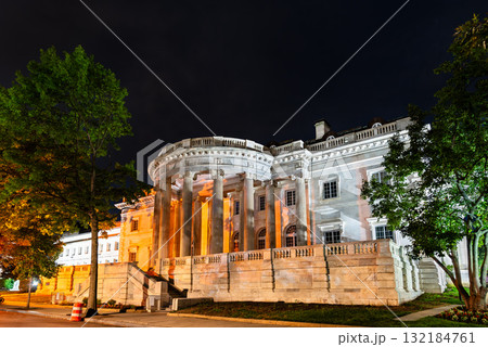 Nighttime view of Memorial Continental Hall in Washington, D.C., United States, featuring its neoclassical facade and grand columns lit under dramatic lighting 132184761