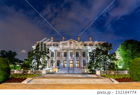 The American Red Cross National Headquarters in Washington, D.C., USA. This historic neoclassical landmark is illuminated against a dramatic night sky 132184774