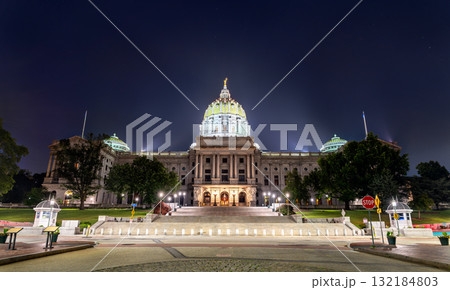 The Pennsylvania State Capitol in Harrisburg, Pennsylvania, USA. The historic Beaux-Arts building is viewed from its grand main entrance on a clear night 132184803