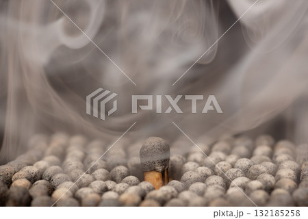 Group of burnt matches with the biggest one in the middle. Concept of ending, burnout, leadership. 132185258