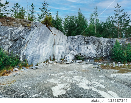 Large stone wall made of marble. 132187345