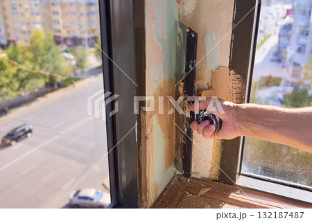 The Wall Repair Process Involves Properly Using Spackling Paste for a Quality Finish The Wall Repair Process Involves Properly Using Spackling Paste for a Quality Finish 132187487