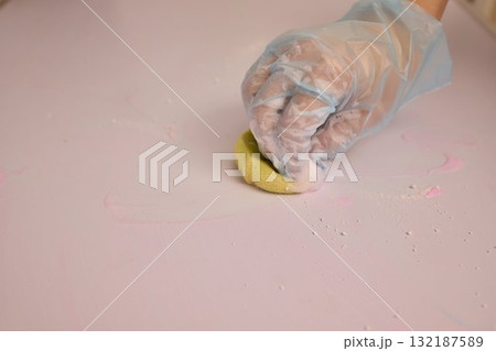 Engaging in Creative Hand son Crafting with Colorful Dough on a Charming Pink Surface Engaging in Creative Hand son Crafting with Colorful Dough on a Charming Pink Surface 132187589