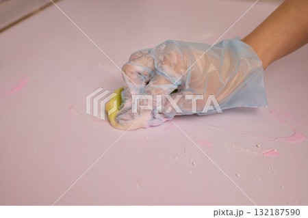 Engaging in Creative Hand son Crafting with Colorful Dough on a Charming Pink Surface 132187590