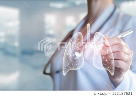 Healthcare professional demonstrates lung health concepts. Healthcare professional demonstrates lung health concepts. 132187621