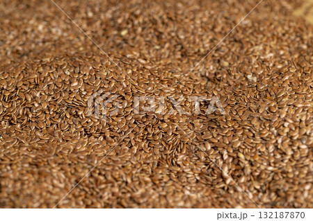 flax seeds are used to produce food, linseed for germination for dietary nutrition, a large number of light brown flax seeds flax seeds are used to produce food, linseed for germination for dietary nutrition, a large number of light brown flax seeds 132187870