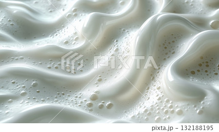 Creamy froth swirls in a textured pattern revealing rich, white texture 132188195