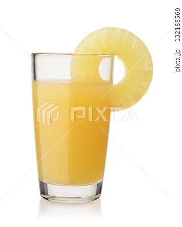 Glass of pineapple juice with pineapple slice 132188569