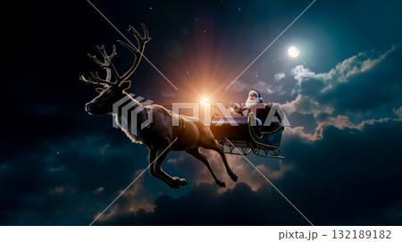 Santa claus flying in his sleigh with reindeer 132189182