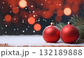 Christmas and New Year holidays concept. Red balls on Christmas background. Winter snowy backdrop. Template for design, banner. 132189888